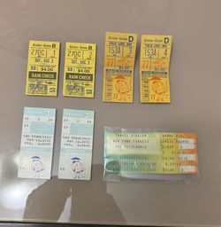 collection of vintage New York Mets and New York Yankees ticket stubs from the 1970s.