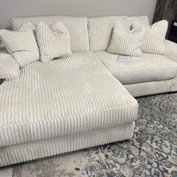 Lindyn Ivory 2 Piece Raf Sectional with Chaise