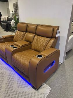 Diamond stitch brown power reclining Sofa w/LED & wireless surround sound