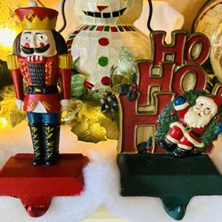 A Pair of Vintage Cast Iron Stocking Hangers