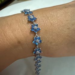 Silver Flower Bracelet with Blue Stones