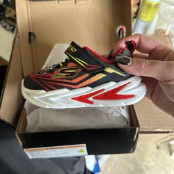 Kids sketchers brand new 7c