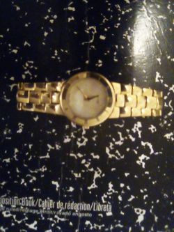 Gold Gucci women's watch