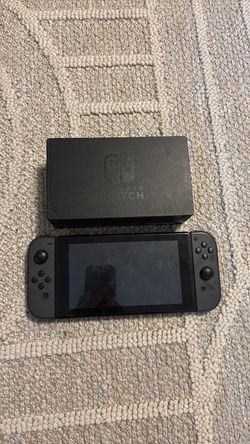 Nintendo Switch 1 with dock