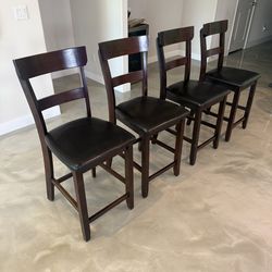 Dark wood bar stools