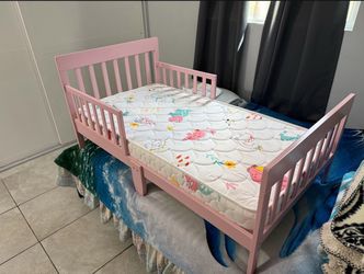 Pink toddler bed