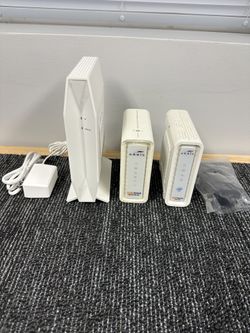 2 Arris SURFBoard Cable Modems and 1 Belkin RT3200 WiFi 6 Router all working