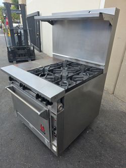 Wolf Range FK363-53 36"wide. 12"w x 26-3/4"d x 2" thick Griddle + 4 Open Top Burner.