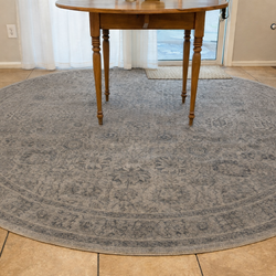 8’ round washable sage rug