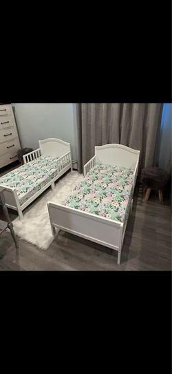 Two White Toddler Bed frames with removable side rails