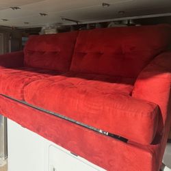 LIKE NEW Red pop-up Sleeper Couch