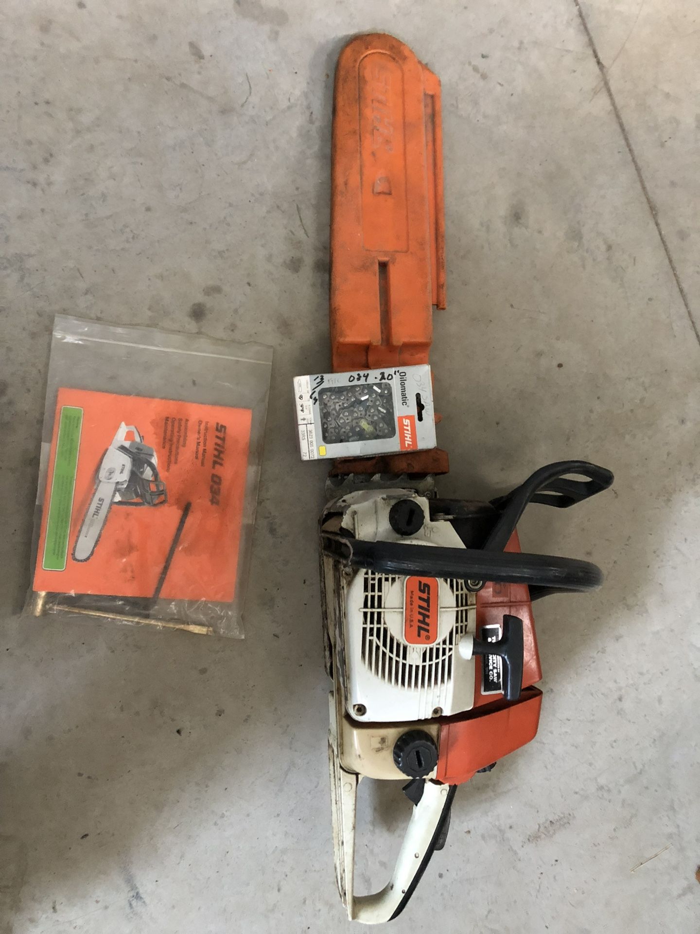 Chainsaw Stihl 034 20” bar with new chain, manual and tool. 