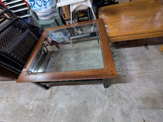 Glass coffee table with chipped corner