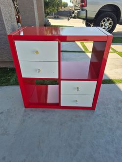 30" wide X 15" deep X 30" height,  cube organizer with 4 drawers in good condition
