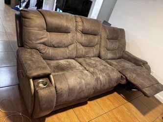 Sofa recliner with head tilt