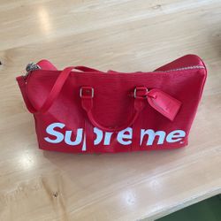 Red Louis Vutton Supreme Duffle Bag