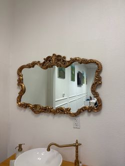 Gold framed vintage style mirror 27” H 38” W