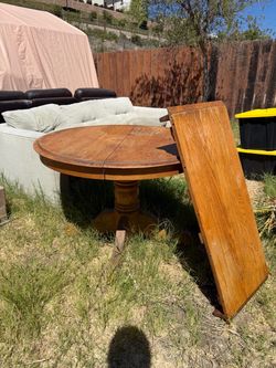 round table with leaf
