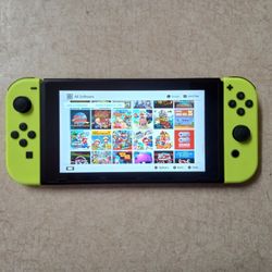 NINTENDO SWITCH *MODDED* with 512GB And Over 7000 GAMES and 4 JOYCONS and WHEELS
