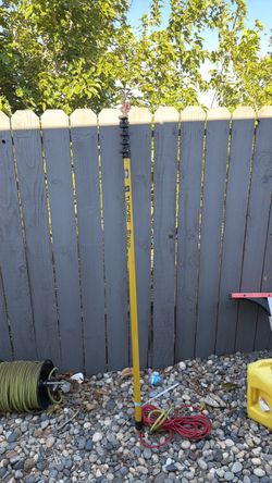Telescoping brush water pump for Solar Cleaning