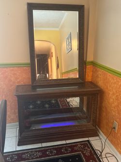Ornate solid wood display cabinet