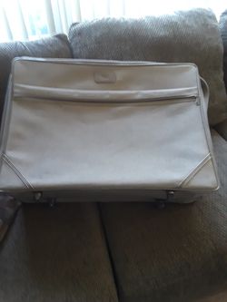 American tourister suitcase.