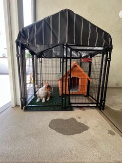 Dog kennel with waterproof cover