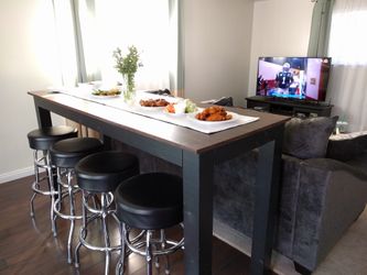 Bar height table w/ swivel stools