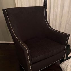 Two black living chairs