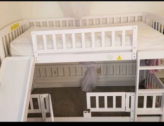 Twin bunk bed with slide