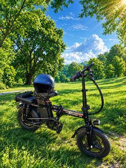 00030miles. New Conditions Super Sport Ebike E-bike electric bike folding.  With keys. Charger. Helmet & New Inner tubes. $500! Or trade for