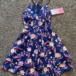 Blue Dress With Floral Designs And Lace Back