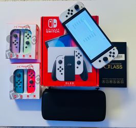 Nintendo Switch – OLED Model with extra accessories  used