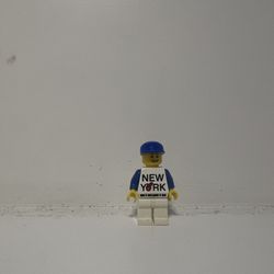 Lego brand store minifig:  Tls114 New York (Apple) Guy