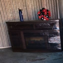 Cabnit With Fire Place In It