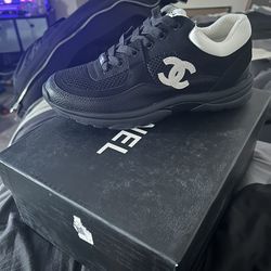 Black and white Chanel trainers