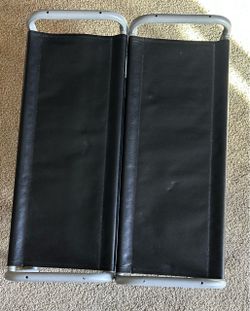 Two black shoe shelves