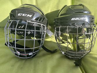 (2) HOCKEY HELMETS