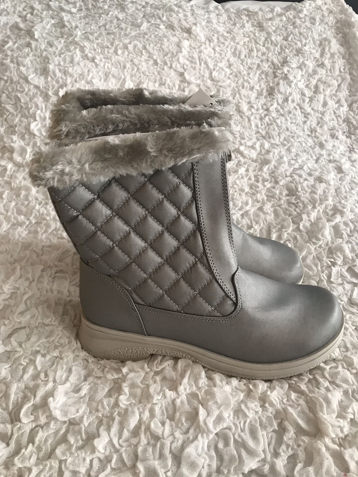 Booties and winter boots. Size 8 and 9. New