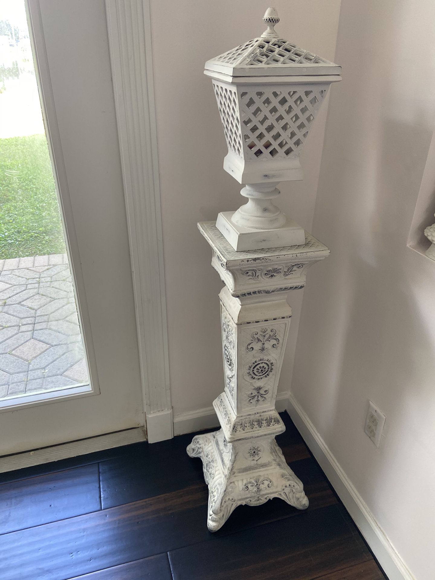 2 large over 4 feet tall candle holders with pedestals