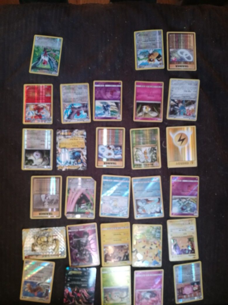 28 Holographic Rare Pokemon Cards Along With 102 Other Cards