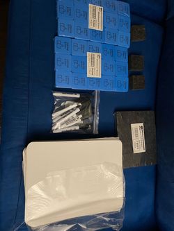 White boards, markers, and erasers for classroom