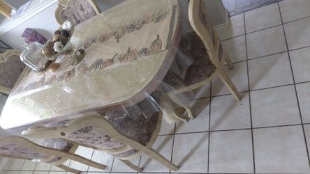 Dinner table with chairs