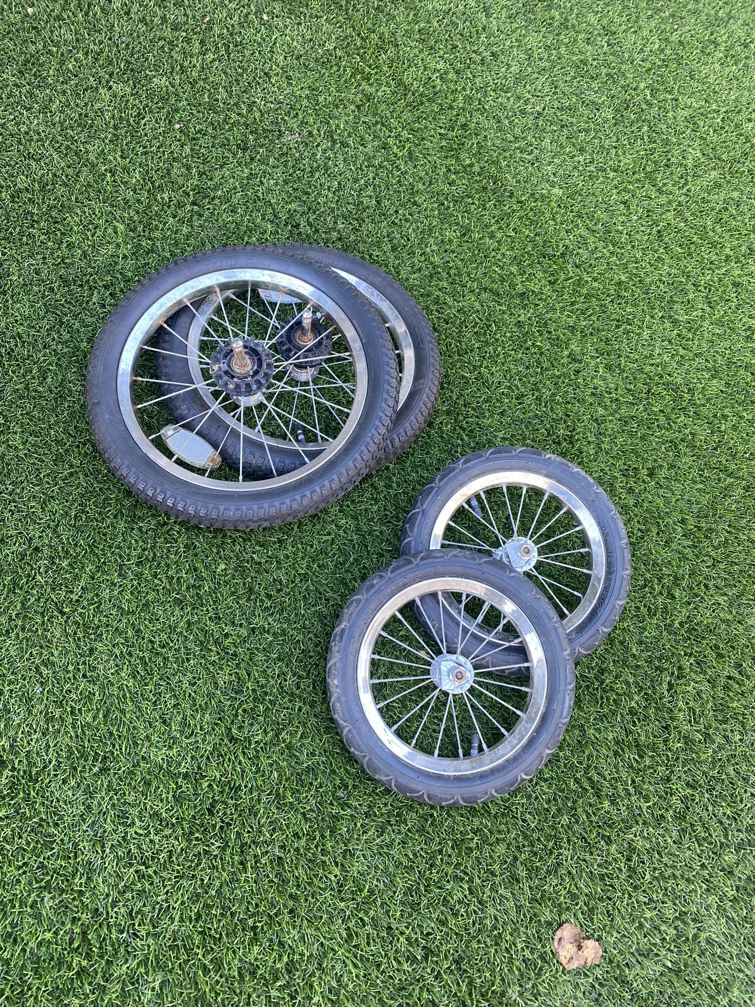 Set Of Wheels And Tires For A Double Jogging Stroller
