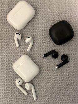Apple AirPods Pro (white case + earbuds)  Apple AirPods 2nd Generation / standard AirPods (white case + earbuds)  Black wireless earbuds with charging