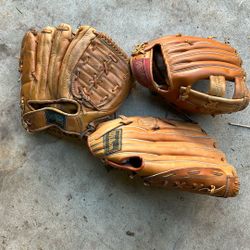 Three Baseball Gloves