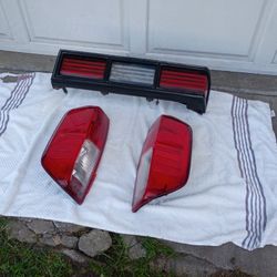 07 Nisson fronter- 2 80 Malibu tail light