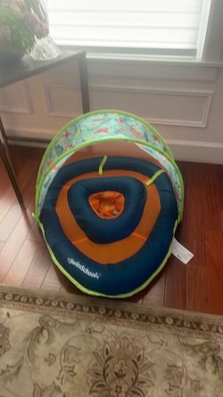 Swim School Float with sun protection cover.