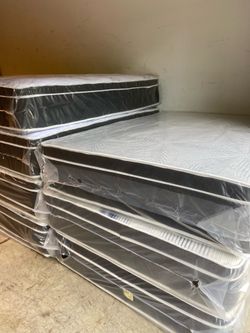 Queen Pillowtop Mattress and box spring new in plastic free delivery in Atlanta