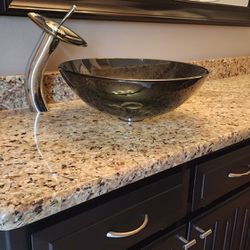 Contemporary glass sink and faucet w/ pop up drain in brushed nickel.  NICE